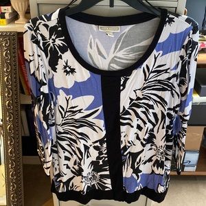 Vibrant blue black and white top large